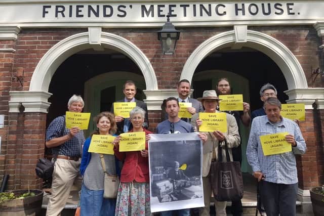 Green and Conservative councillors stood with campaigners to save Hove Library from being sold