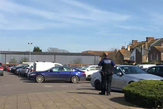 Police officers in the Waitrose car park