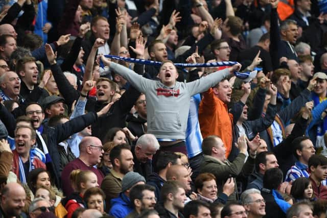 Albion fans celebrating taking the lead. Picture by Phil Westlake (PW Sporting Photography)