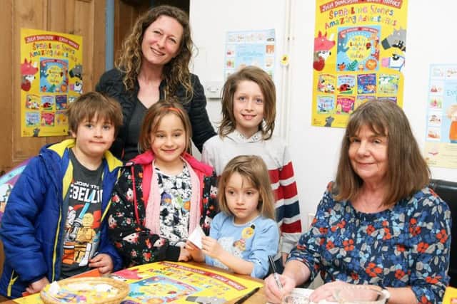 Author Julia Donaldson at The Steyning Bookshop with Joanna Rachtan and her children, from left, Dexter, seven, Eloise, seven, Lucy, five, and John, nine. Picture: Derek Martin DM1840295a