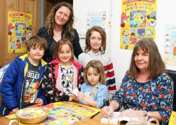 Author Julia Donaldson at The Steyning Bookshop with Joanna Rachtan and her children, from left, Dexter, seven, Eloise, seven, Lucy, five, and John, nine. Picture: Derek Martin DM1840295a