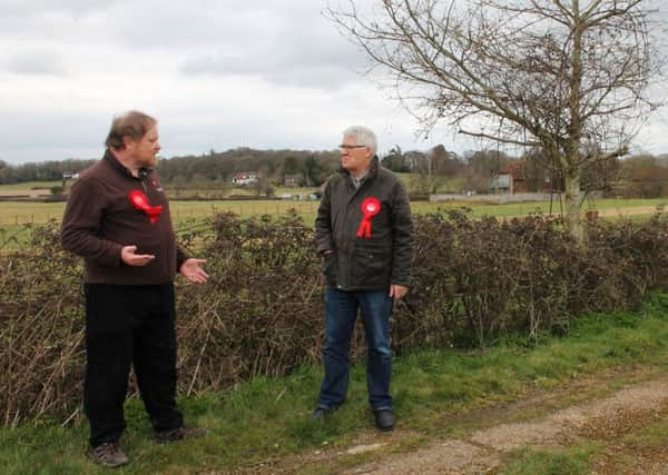 Labour branch chairman Will Matthews and John Kelly at the site off Ockley Lane in Hassocks, where the 500 homes are to be built