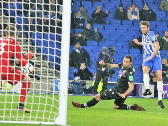 Dale Stephens scores against Crystal Palace in Albion's FA Cup win in January. Picture by Angela Brinkhurst