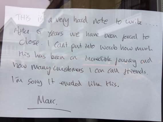 A note from owner Marc Perry posted in the Forum's window