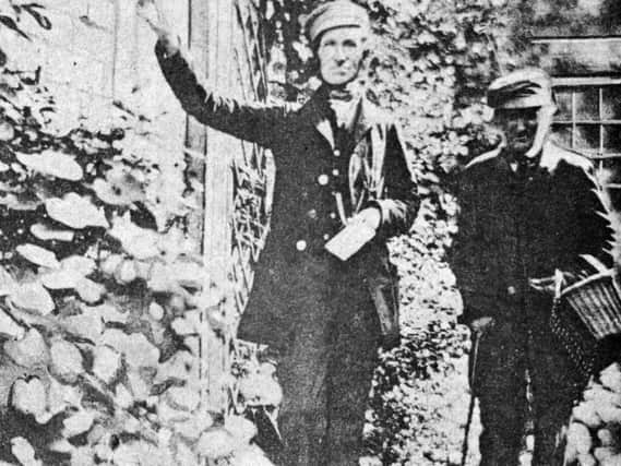 A Horsham postman, left, outside 9 Carfax in 1850. The picture was taken by Thomas Honywood and was loaned to the County Times by Mr H Taylor