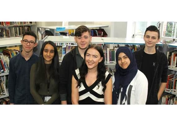 Hove Park School former student Kelly Romero (fourth from left) with sixth formers.