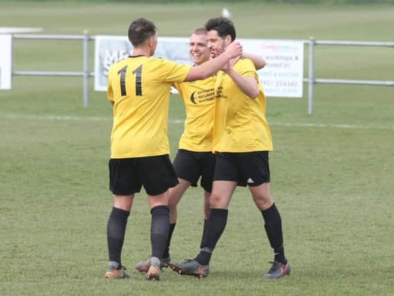 Grant Thetford - who scored from the spot against Worthing United last night - celebrates his goal on Saturday. Picture by Derek Martin