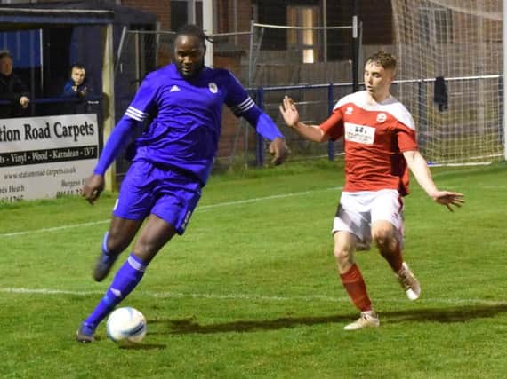 Action from Arundel's clash at Haywards Heath last night. Picture by Grahame Lehkyj