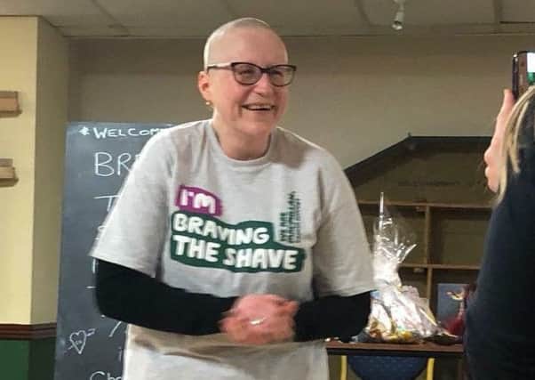 Anita Frecknell from Horsham shaved her head for two cancer charities SUS-180416-164251001
