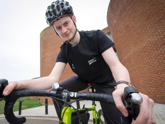 Jake Thompson has created an innovative new bike light which allows cyclists to flag up dangerous potholes and junctions
