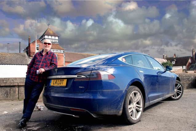 'Seamless and thrilling acceleration': Local owner Roger Ross and his Tesla S