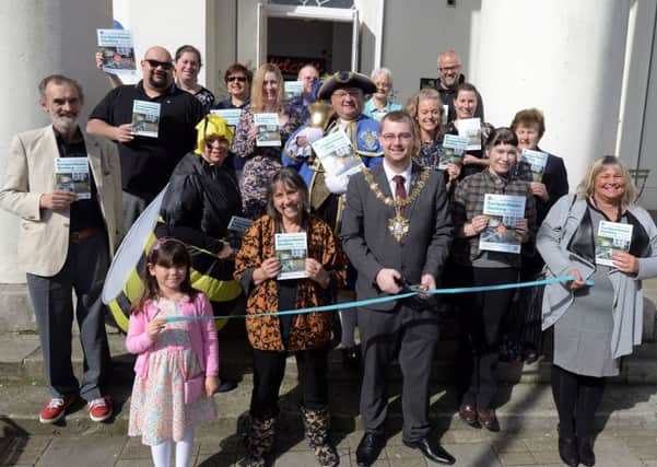Worthing mayor Alex Harman cuts the ribbon to launch Eco Open Houses Worthing. Pictures: Kate Shemilt ks180172-1