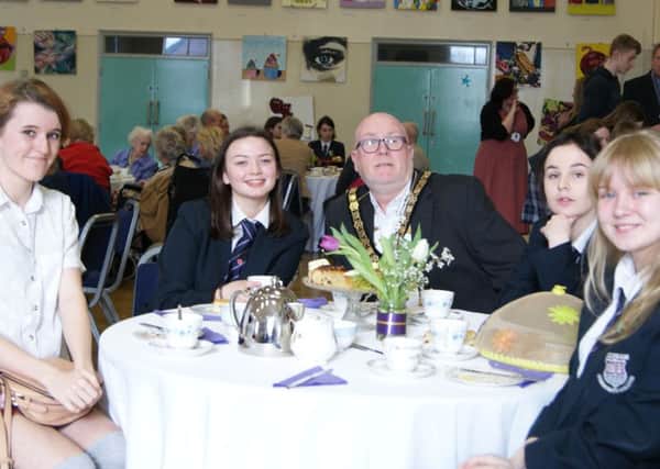 Maisie ONeill, head girl, with Bognor Regis Town Mayor, cllr Phil Woodhall, and some Felpham Community College Rights Respecting School Ambassadors