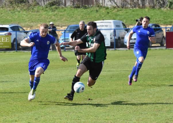 Max Miller tries to get past pagham's Daryl Wollers / Picture by Grahame Lehkyj