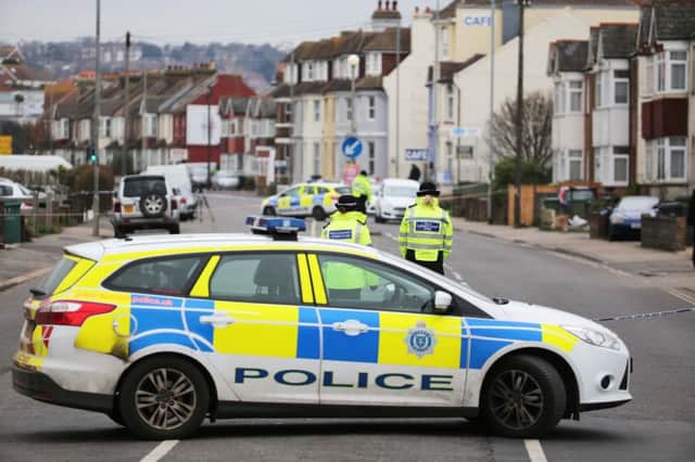 Police investigate the scene at Bexhill Road. Photo by Eddie Mitchell