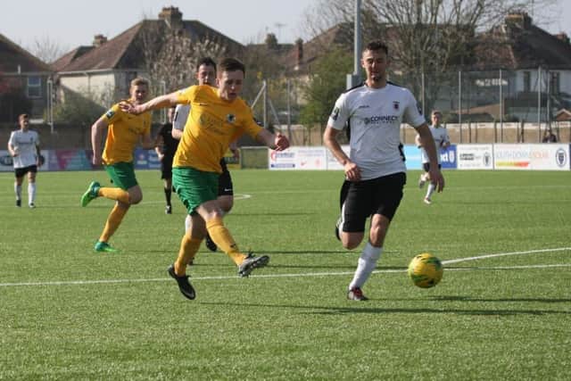 Toby House gets a shot away in Horshams 3-0 defeat at home to Faversham Town. Picture by John Lines