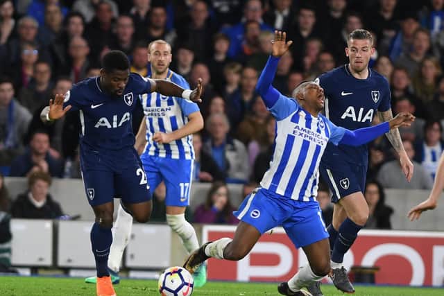 Albion v Spurs. Serge Aurier brings down Jose Izquierdo for Brighton's penalty. Picture by PW Sporting Photography