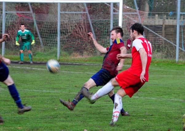 Grant Radmore notched the semi-final winner for Bosham / Picture by Kate Shemilt