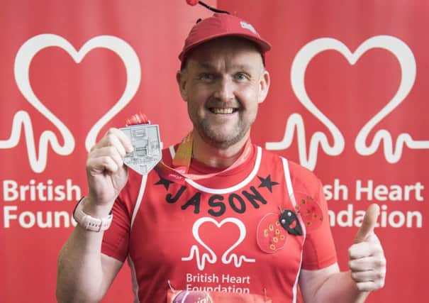 Jason Rassell after completing the Virgin London Marathon 2018 Photography by DFphotography.co.uk / Danny Fitzpatrick