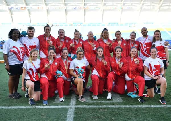 The England women's sevens squad with their medals / Picture by Getty Images