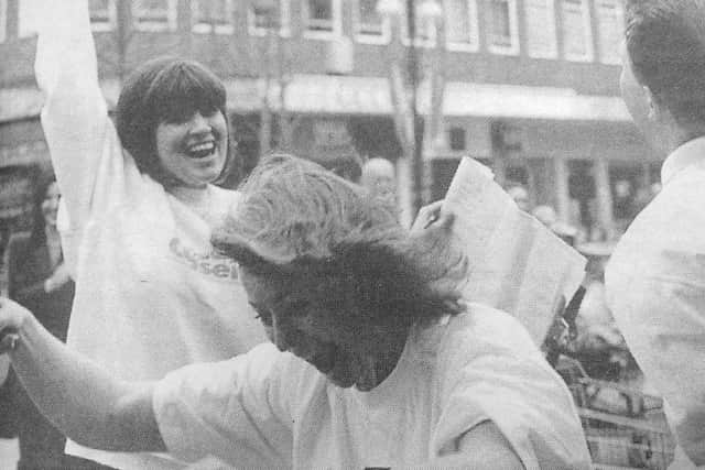 The Midland Bank team cross the line in the 1998 pancake race