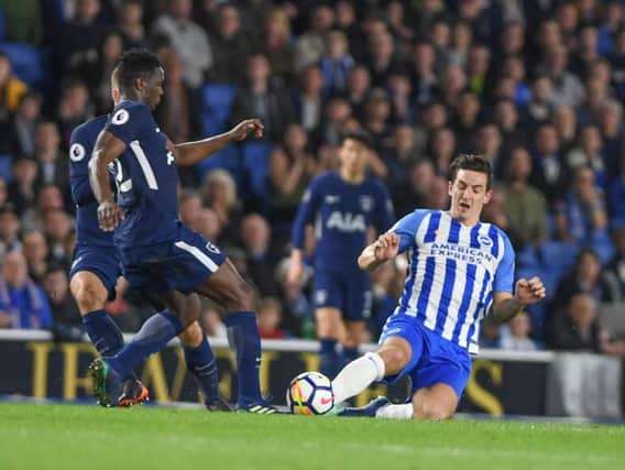 Lewis Dunk challenges Tottenham midfielder Victor Wanyama on Tuesday. Picture by Phil Westlake (PW Sporting Photography)