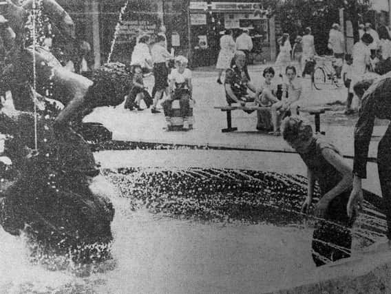 A paddle in the Queens Square fountain in 1978
