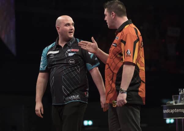 Rob Cross in conversation with Daryl Gurney. Picture courtesy Lawrence Lustig/PDC