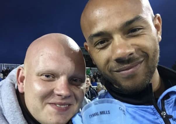 Ryan Purvis with Tymal Mills