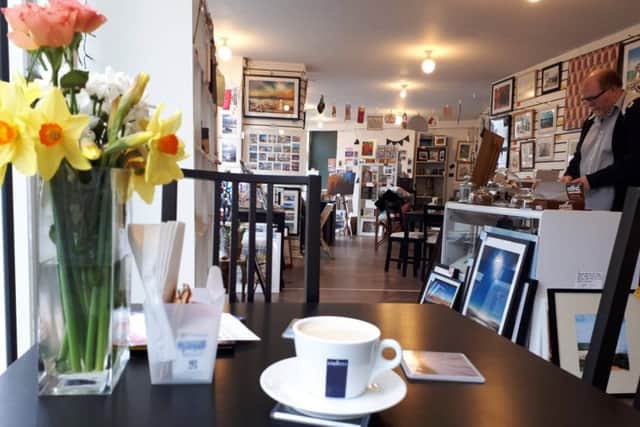 Take a seat and relax with a cup of coffee at Pier Road Coffee and Art in Littlehampton