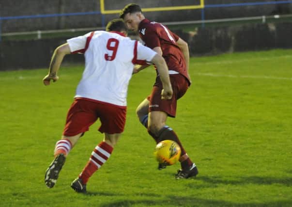 Action from Little Common's cup semi-final win over Langney Wanderers on Wednesday, last week. Picture by Simon Newstead