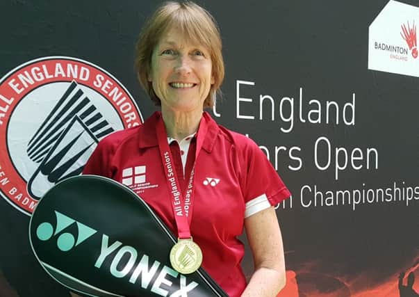 Cathy Bargh with her women's over-55 singles gold medal at the All England Seniors Open Badminton Championships.