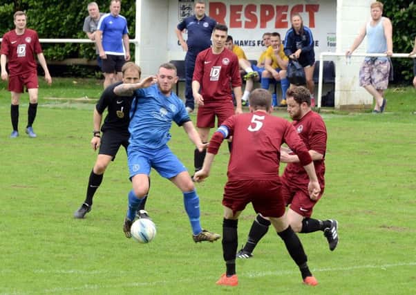 Rich Carter in action for Midhurst in their win over Storrington / Picture by Kate Shemilt