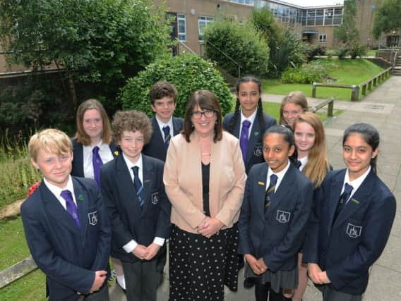 Rev Chrissie Millwood and some of the Holy Trinity students