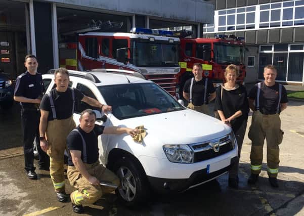 High Sheriff of West Sussex Caroline Nicholls attended Worthing Fire Station's charity car wash event