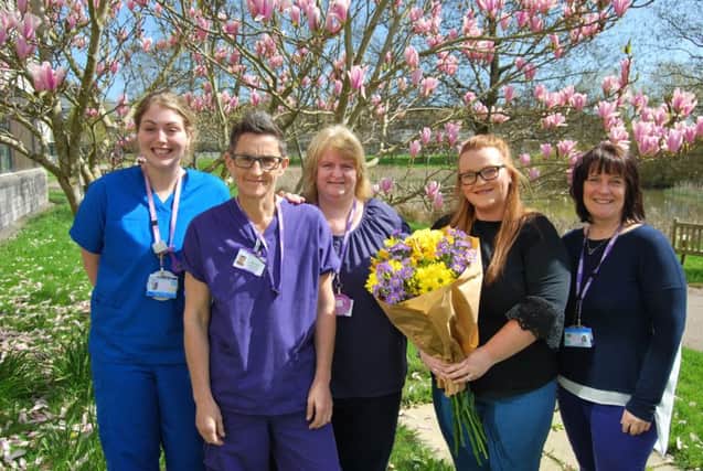 Jess Hales (second right), Jane Bedford-Clark (far right) and some of the midwifery team. SUS-180424-100823001