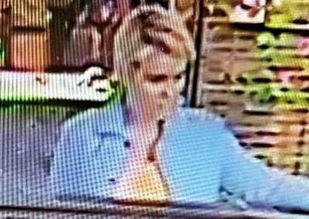 Police would like to identify this woman after a Rolex was stolen from Ebony Jewellers in South Street. Issued by Sussex Police