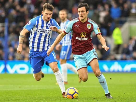 Pascal Gross closes down Jack Cork in Albion's 0-0 draw with Burnley at the Amex in December. Picture by Phil Westlake (PW Sporting Photography)