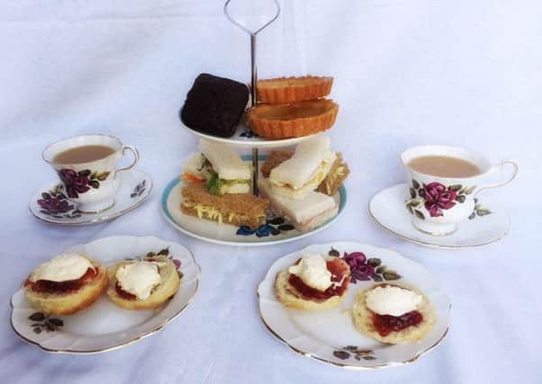 Crystal will serve tea and scones amongst other tasty treats