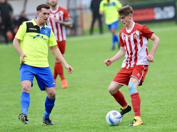 Alex Townley in action for Steyning Town. Picture by Stephen Goodger