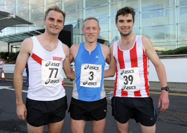 James Baker, centre, with his closest rivals after the Lakeside 5k / Picture by Malcolm Wells