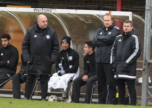Outgoing Loxwood manager Dave Cocoracchio and replacement Gareth Neathy (right) in the dugout earlier in the season. Picture by PW Sporting Photography SUS-171123-105219001