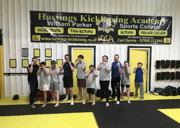 Pupils from New Horizons School who completed their first kickboxing grading at Hastings Kickboxing Academy SUS-180430-174033002