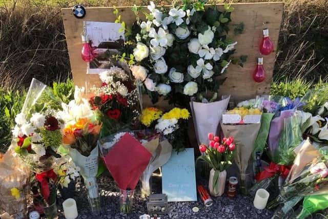 A flower tribute left by Jordan's friends and family