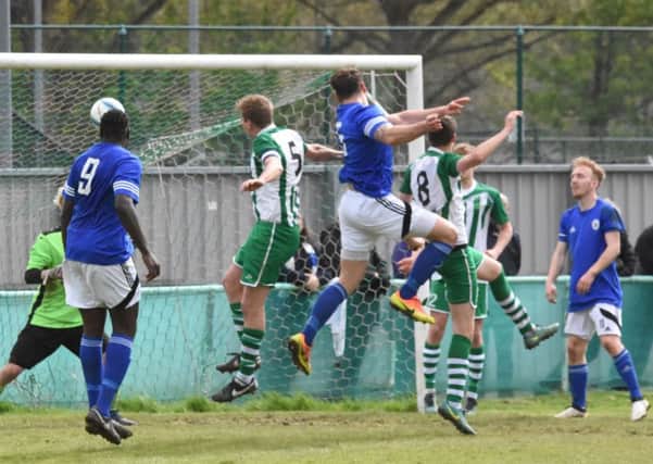Action from Haywards Heath's visit to Chichester City / Picture by Grahame Lehkyj