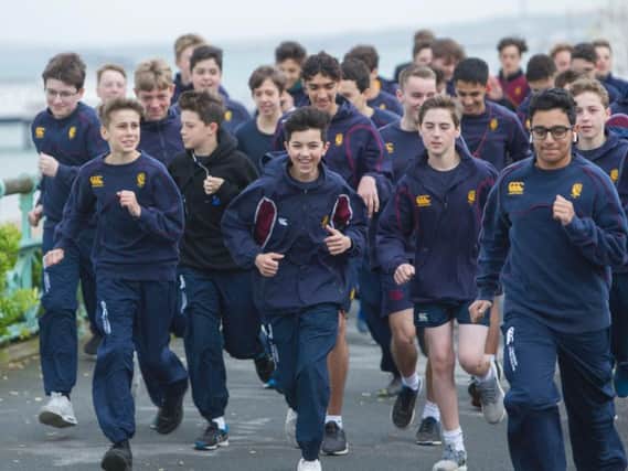 Arun Campbell (centre) (14) who along with 65 of his classmates from Brighton College ran 3.7 miles for his cousin Matt (Photograph:David McHugh/Brighton Pictures)