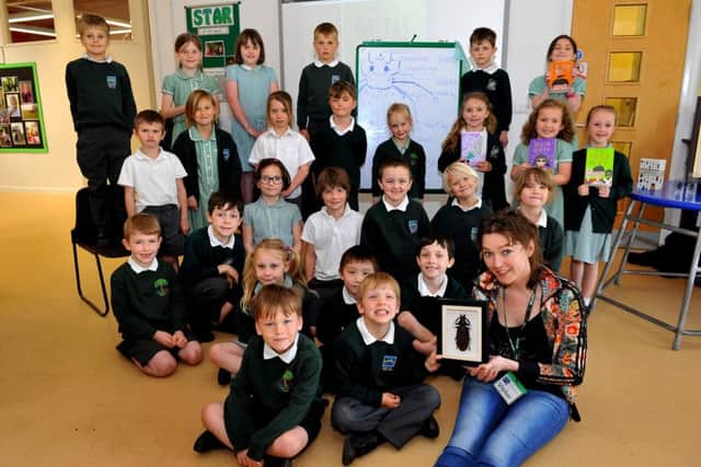 Author visit from MG Leonard (right) at Bury CE Primary School, along with visiting children from Easebourne Primary (Picture: SR1811306)