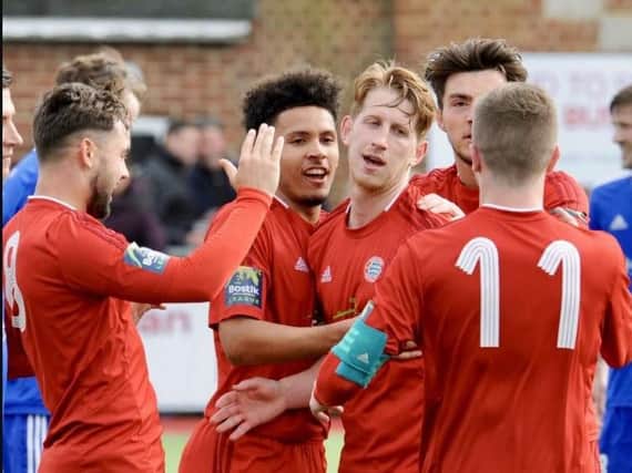Worthing celebrate substitute Sam Rents' goal in the final day draw with Brightlingsea Regent. Picture by Stephen Goodger