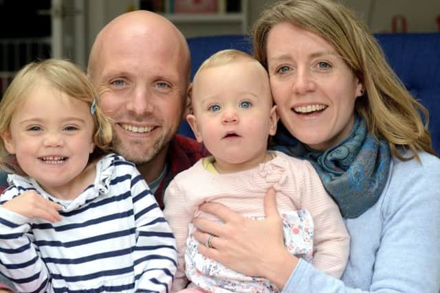 Jon and Liz with their daughters Ailla and Lana, who are now both fully healthy. Picture: Kate Shemilt