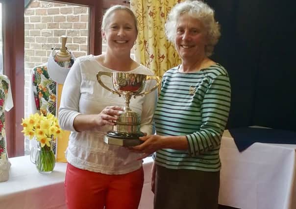 Jane Russell (Bognor lady captain) presents the Thorpe Cup to Chloe Briance